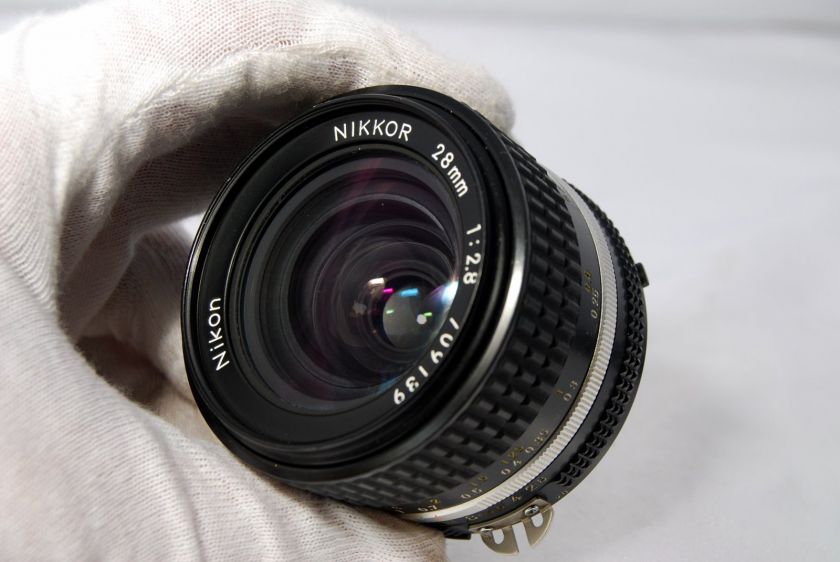 Nikon 28mm f2.8 lens Nikkor AIS AIS manual focus with L37c filter 