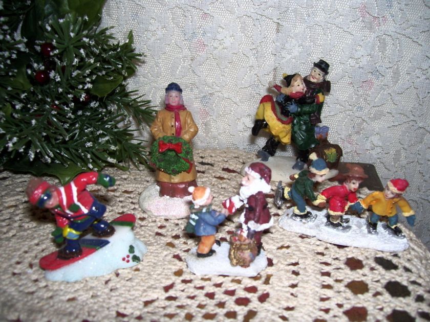 CHRISTMAS VILLAGE SKATERS ETC SET/5 DECORATIVE  