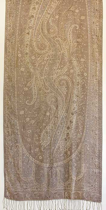 This is an elegant, light weight shawl with a jacquard woven, jamavar 